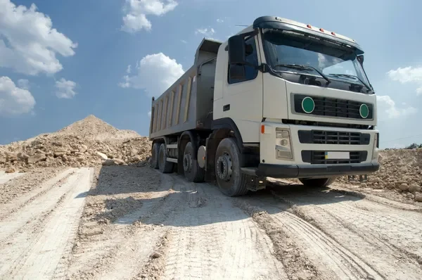 Dump truck at a gravel work site