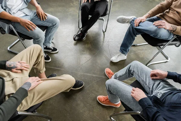 People seated in a group discussion