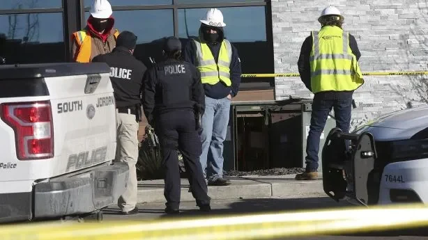 Police officers at a construction-site incident